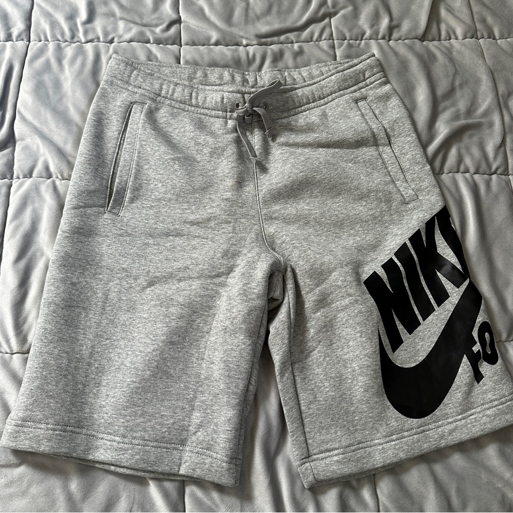 Nike Men's Athletic Gray Shorts with Black Logo